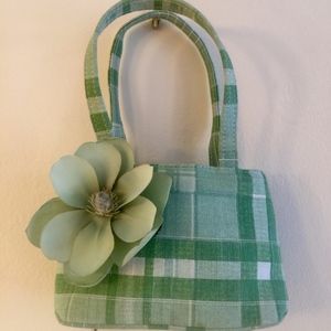 Green and white summer purse with flower